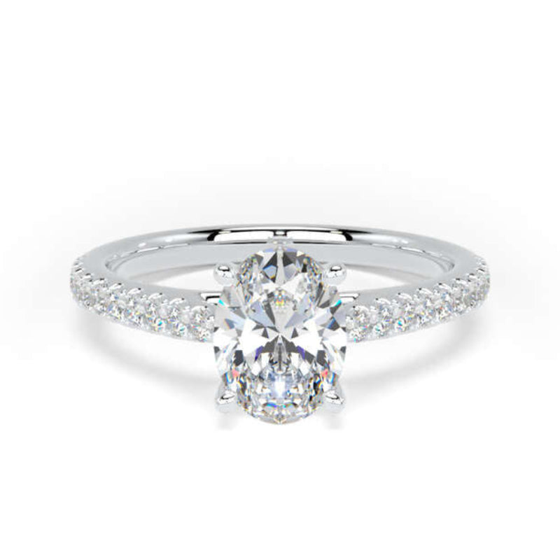 A radiant cut diamond engagement ring with a pavé-set diamond band in a silver-colored metal, shown on a clean white background.