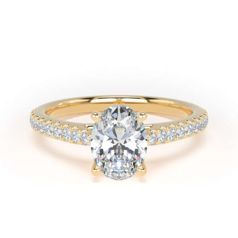 A yellow gold engagement ring featuring a large oval-cut center stone and a pavé-set diamond band, shown on a clean white background.