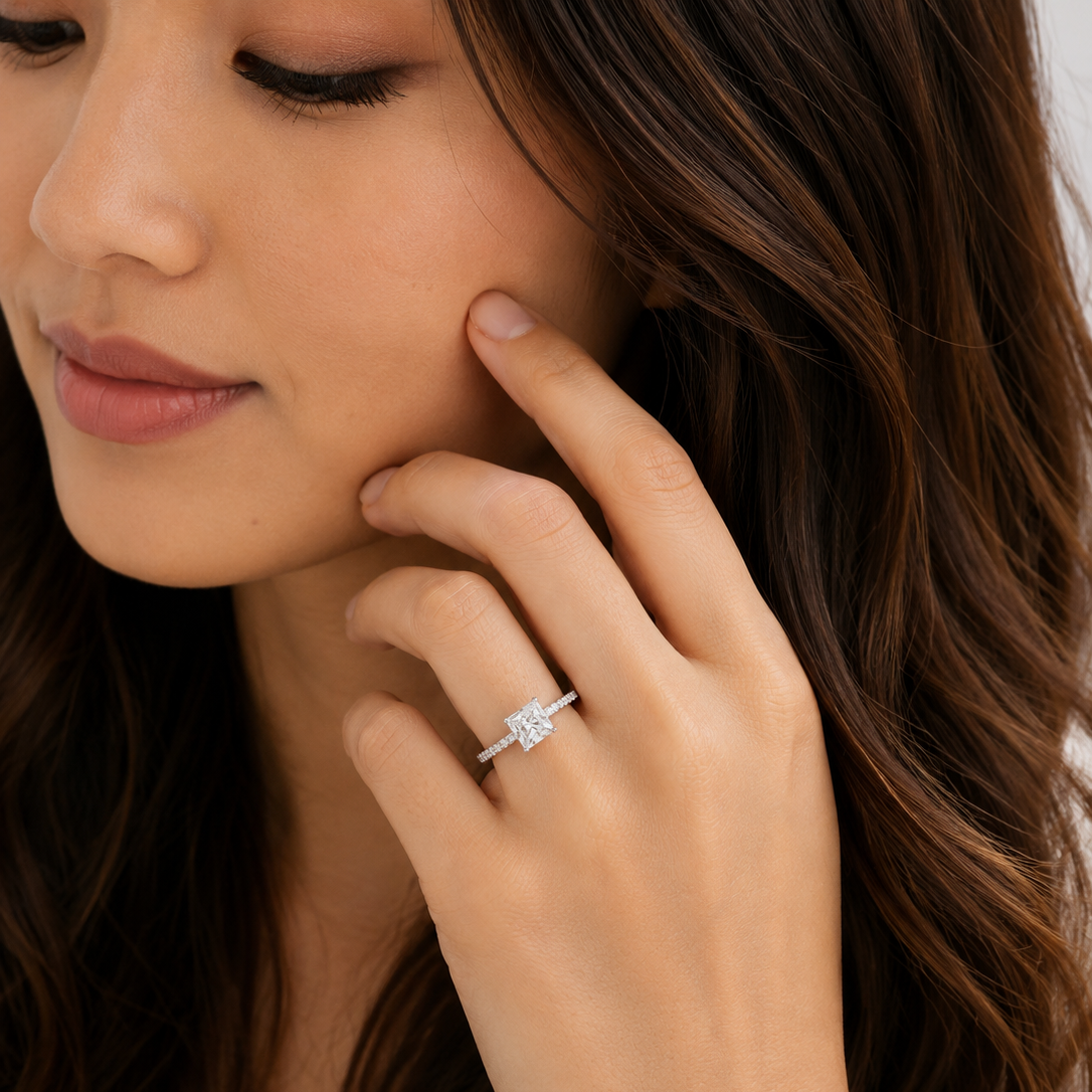 Close-up of a woman wearing a diamond ring on her finger