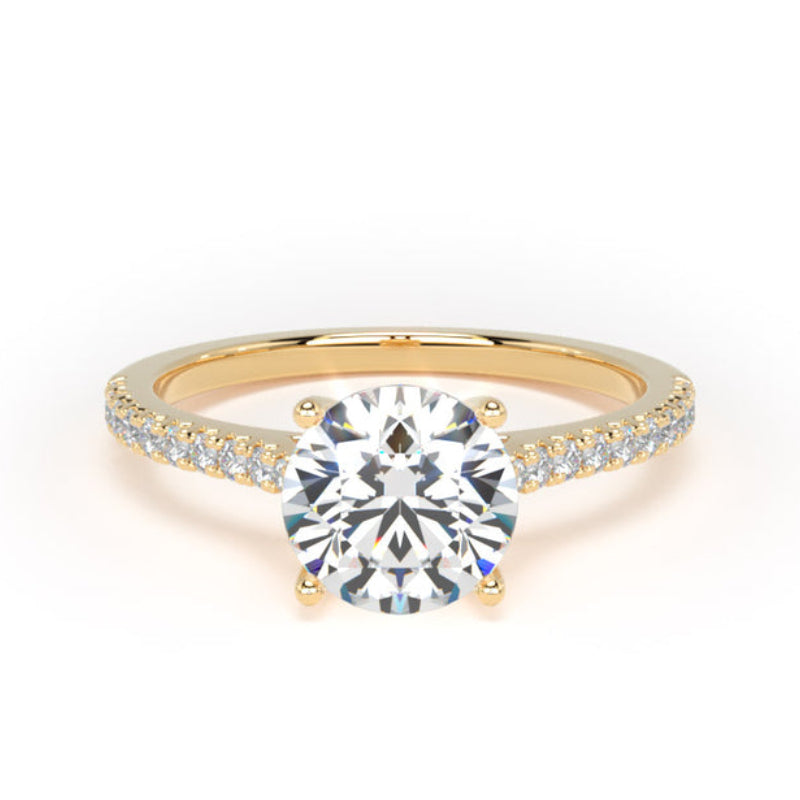Gold ring with a diamond on a white background