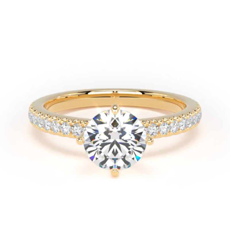 A yellow gold solitaire engagement ring featuring a round brilliant-cut center stone and a pavé-set diamond band, shown on a clean white background.